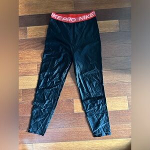 Shiny Nike leggings, black and red with logo band